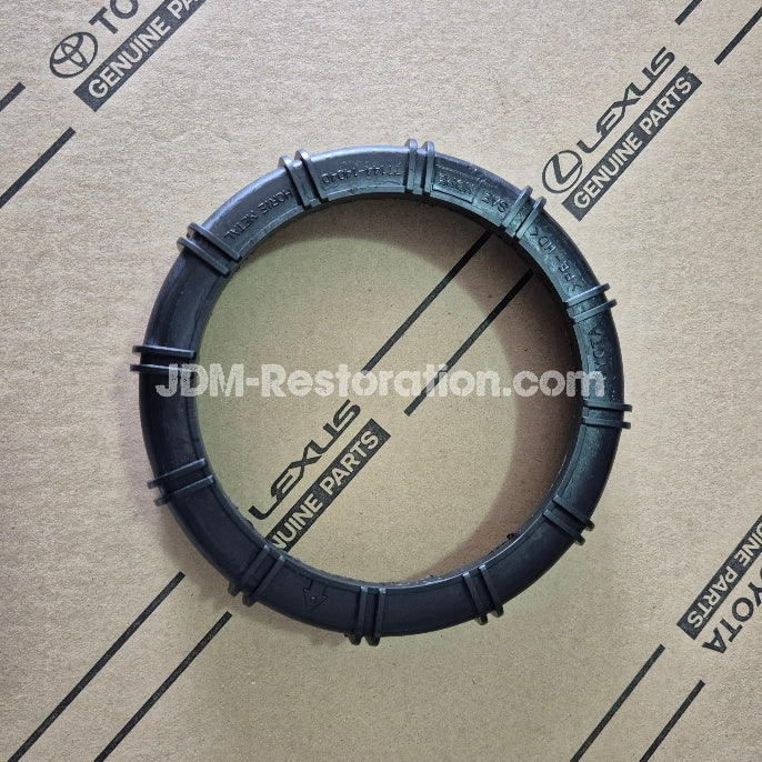 Black rubber ring on a Lexus Genuine Parts branded cardboard background
