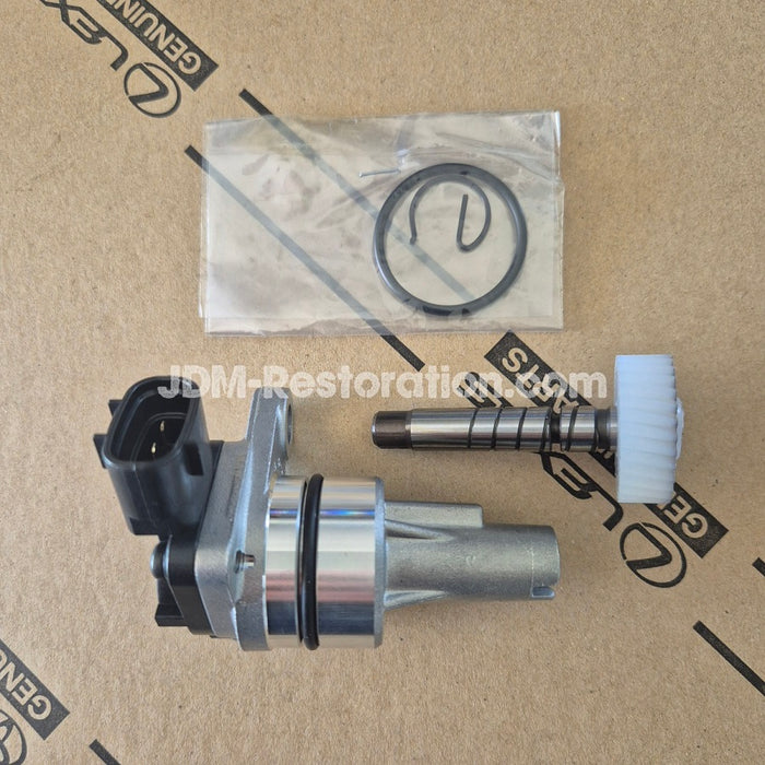 Mechanical parts on a cardboard background with 'JDM-Restoration.com' branding.