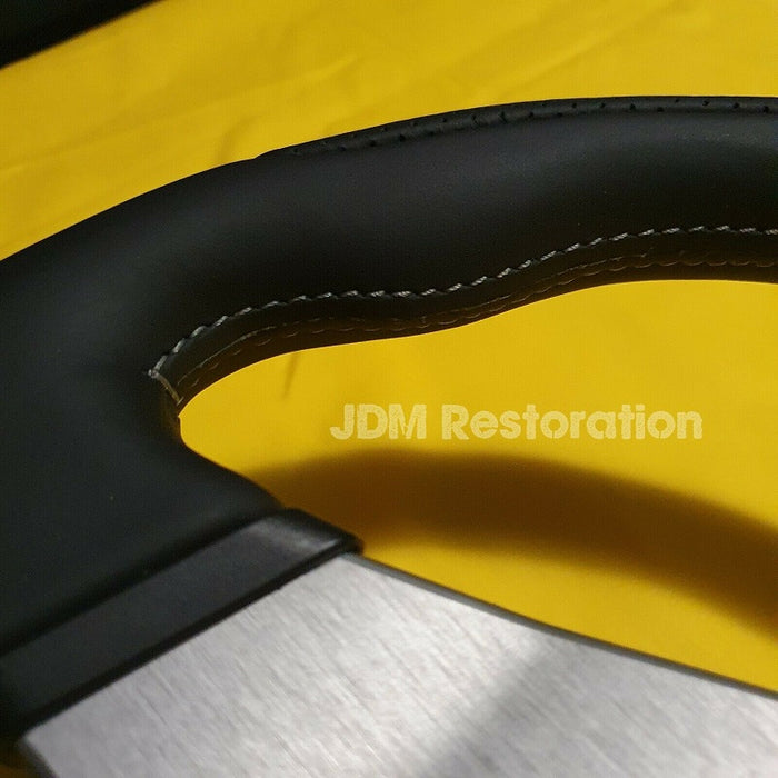 Mitsubishi Evo CT9A Retrimmed Steering Wheel Service