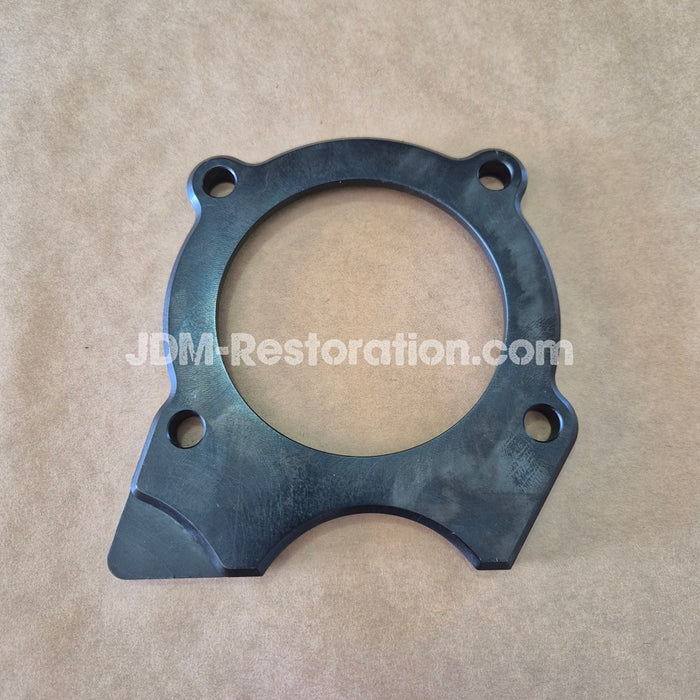 Black gasket on a beige background with 'JDM-Restoration.com' text.