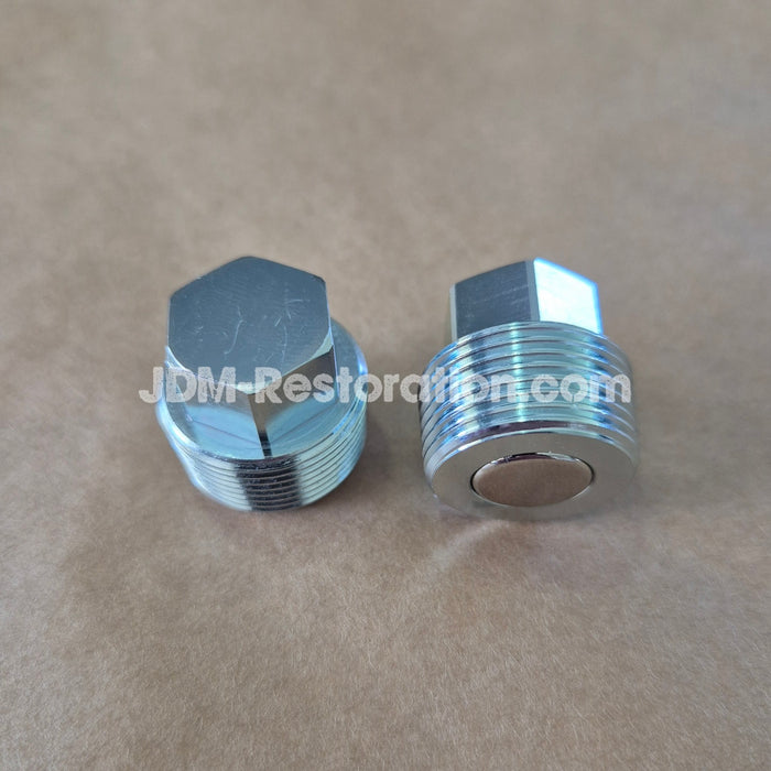 Two metal hex nuts on a beige background with 'JDM Restoration.com' branding.