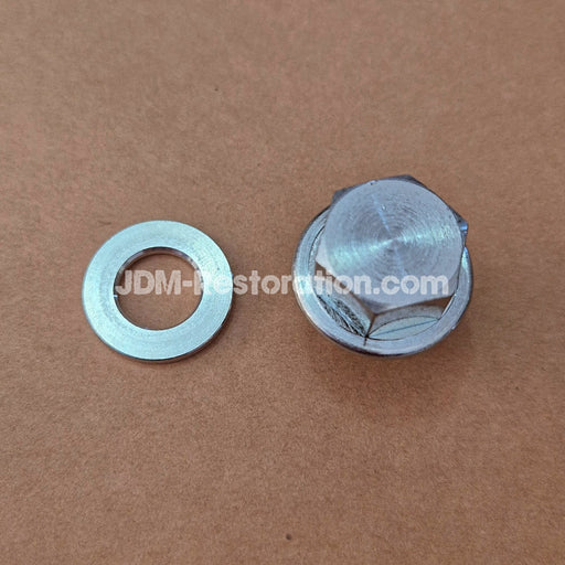 Metal washer and metal boss on a brown background with 'JDM-Restoration.com' text.