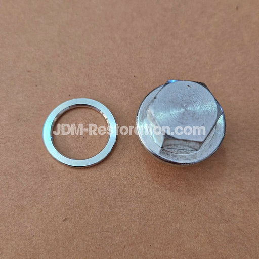 Metallic washer and cylindrical component on a brown background with 'JDM-Restoration.com' branding.