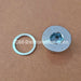 Metal washer and metal flange on a brown background with 'DM-Restoration.com' branding.