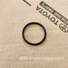 Black rubber ring on a cardboard background with Toyota branding