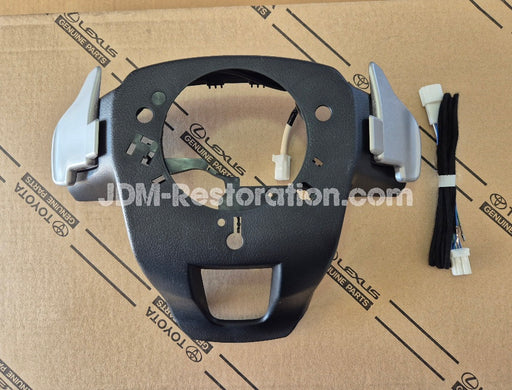 Car part on a cardboard background with JDM-Restoration.com branding.
