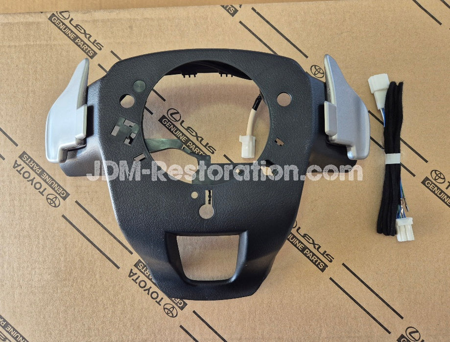 Car part on a cardboard background with JDM-Restoration.com branding.