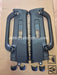 Two black car B Pillar Handles on a cardboard background with 'JDM-Restoration.com' branding.