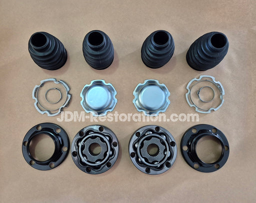 Set of mechanical parts including black rubber boots and metal washers on a brown background with 'JDM Restoration.com' branding.