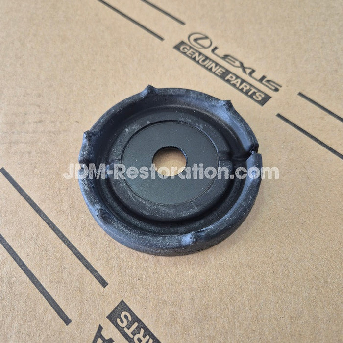 Black rubber part on a cardboard background with 'JDM-Restoration.com' branding.