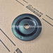 Black rubber wheel bearing on a Lexus branded cardboard box