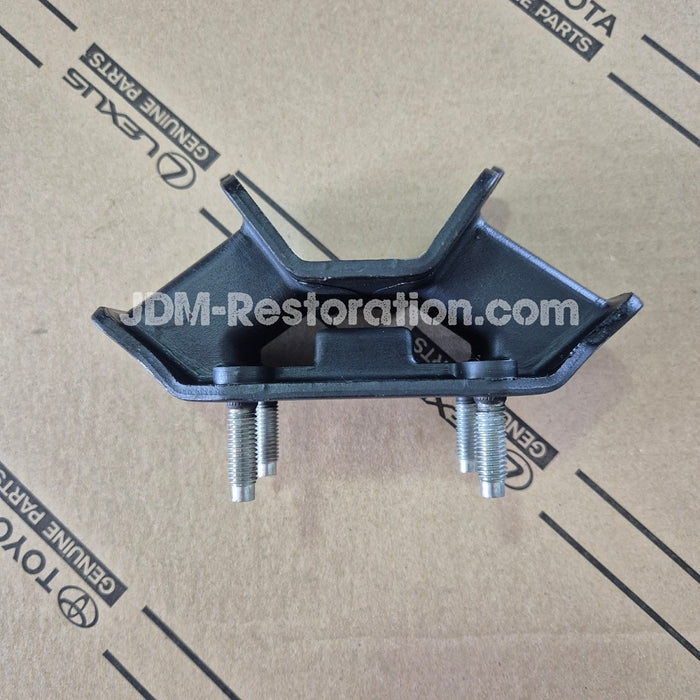 Black metal bracket with screws on a cardboard background with 'JDM-Restoration.com' branding.