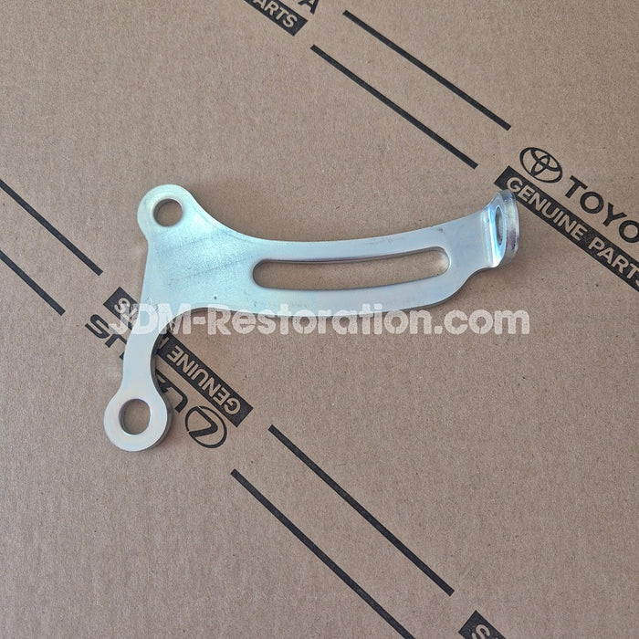 Metal bracket on a Toyota branded cardboard background