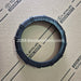 Black rubber ring on a Lexus Genuine Parts branded cardboard background