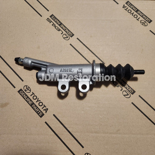 A new genuine Toyota clutch slave cylinder for V160 / V161 models, displayed on a surface with Toyota branding.